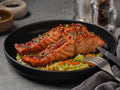 Honey Garlic Salmon! This dish is a real delight, the salmon is soft and glazed with a delicious honey and garlic sauce; it goes very well with rice, vegetables or a delicious salad.